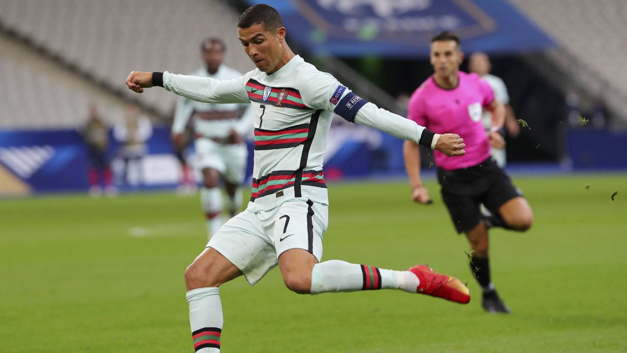 Cristiano Ronaldo shoots during a UEFA Nations League soccer match between France and Portugal in Saint-Denis, France, on Sunday. (AP Photo/Thibault Camus)