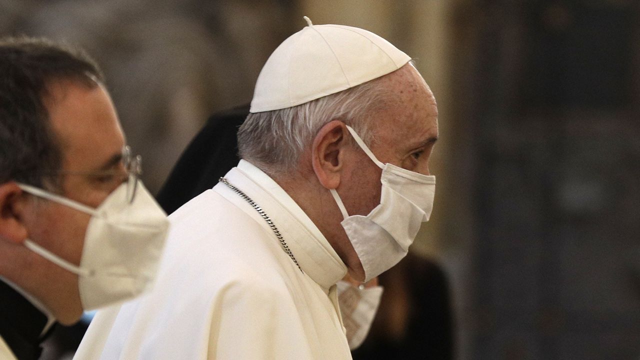 Pope Francis attends a inter-religious ceremony for peace in the Basilica of Santa Maria in Aracoeli, in Rome Tuesday, Oct. 20, 2020 (AP Photo/Gregorio Borgia)