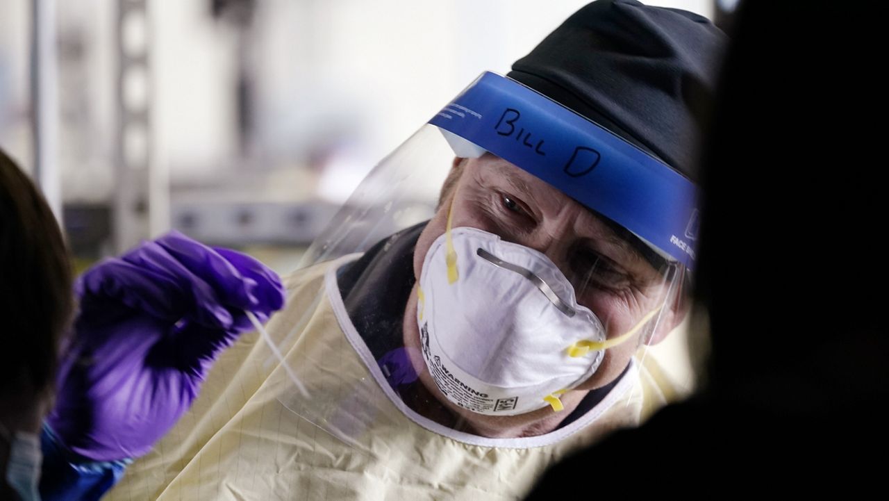 AP Photo/Elaine Thompson