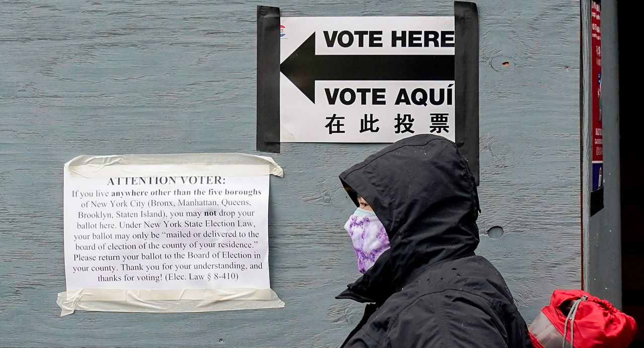 Upper Manhattan voters go to the polls despite long lines