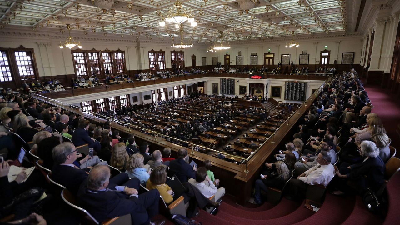 FILE - In this Tuesday, Feb. 5, 2019 file photo, A full gallery oversees the Texas Gov. Greg Abbott giving his State of the State Address in the House Chamber in Austin, Texas. (AP Photo/Eric Gay)