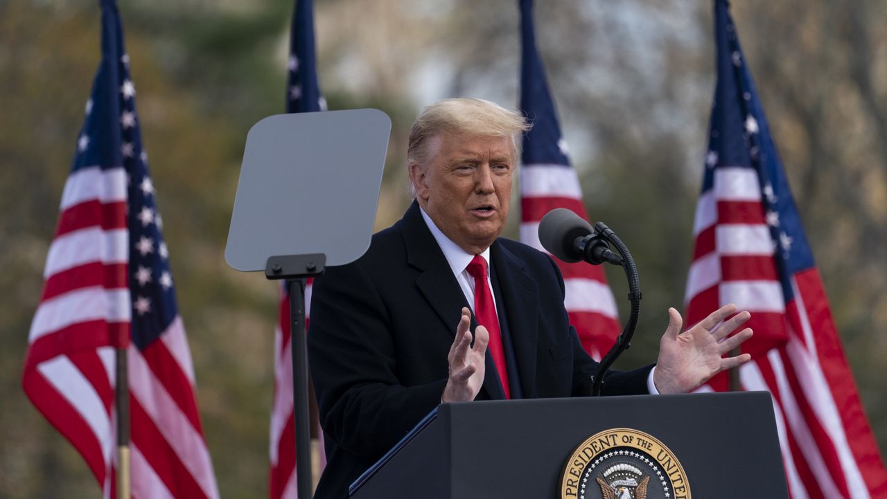 President Donald Trump speaks at a campaign rally at Keith House, Washington's Headquarters, Saturday, Oct. 31, 2020, in Newtown, Pa. (AP Photo/Alex Brandon)