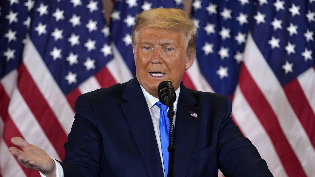 President Donald Trump speaks in the East Room of the White House early Wednesday. (AP Photo/Evan Vucci)