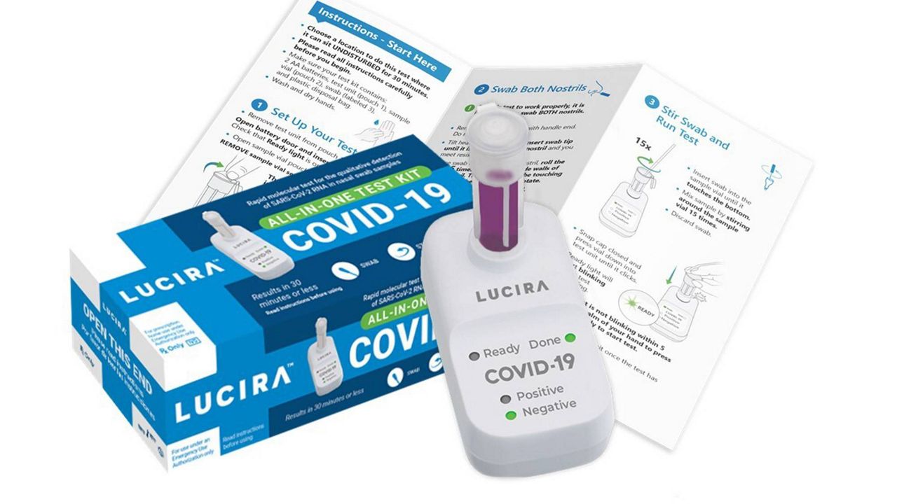 This image provided by Lucira Health shows the Lucira COVID-19 all-in-one home test kit. The FDA granted emergency authorization on Tuesday, Nov. 17, 2020, to the single-use test kit from Lucira Health, a California manufacturer. The test can performed entirely at home and delivers results in 30 minutes. (Lucira Health via AP)