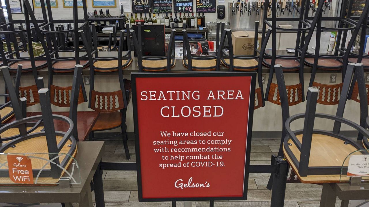 An indoors sitting bar is closed inside the Gelson's Market in the Los Feliz neighborhood of Los Angeles on March 26, 2020. (AP/Damian Dovarganes)