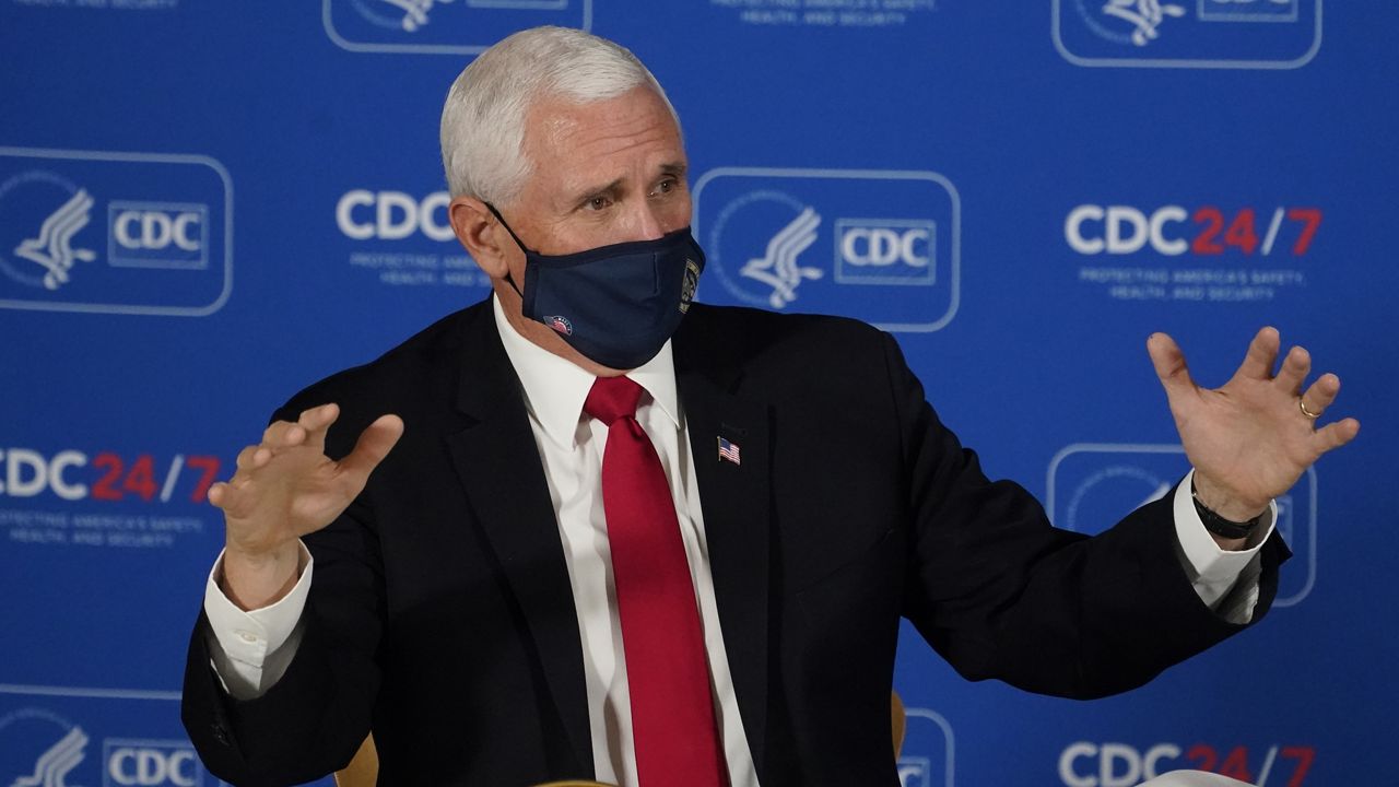 Vice President Mike Pence speaks during a briefing on COVID-19 at the Centers for Disease Control and Prevention Friday, Dec. 4, 2020, in Atlanta. (AP Photo/John Bazemore)