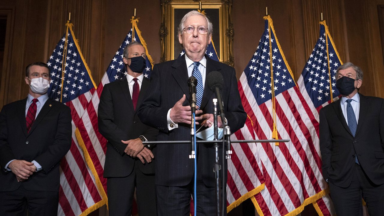 Senate Majority Leader Mitch McConnell of Kentucky, speaks to the media after the Republican's weekly Senate luncheon, Tuesday, Dec. 8, 2020 at the Capitol in Washington. (Kevin Dietsch/Pool via AP)