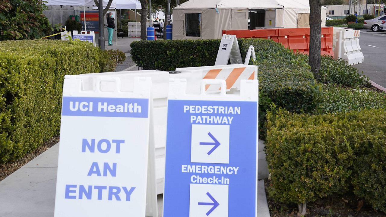 Medical tents are set up outside the emergency room at UCI Medical Center Thursday, Dec 17, 2020, in Irvine, Calif. (AP Photo/Ashley Landis)