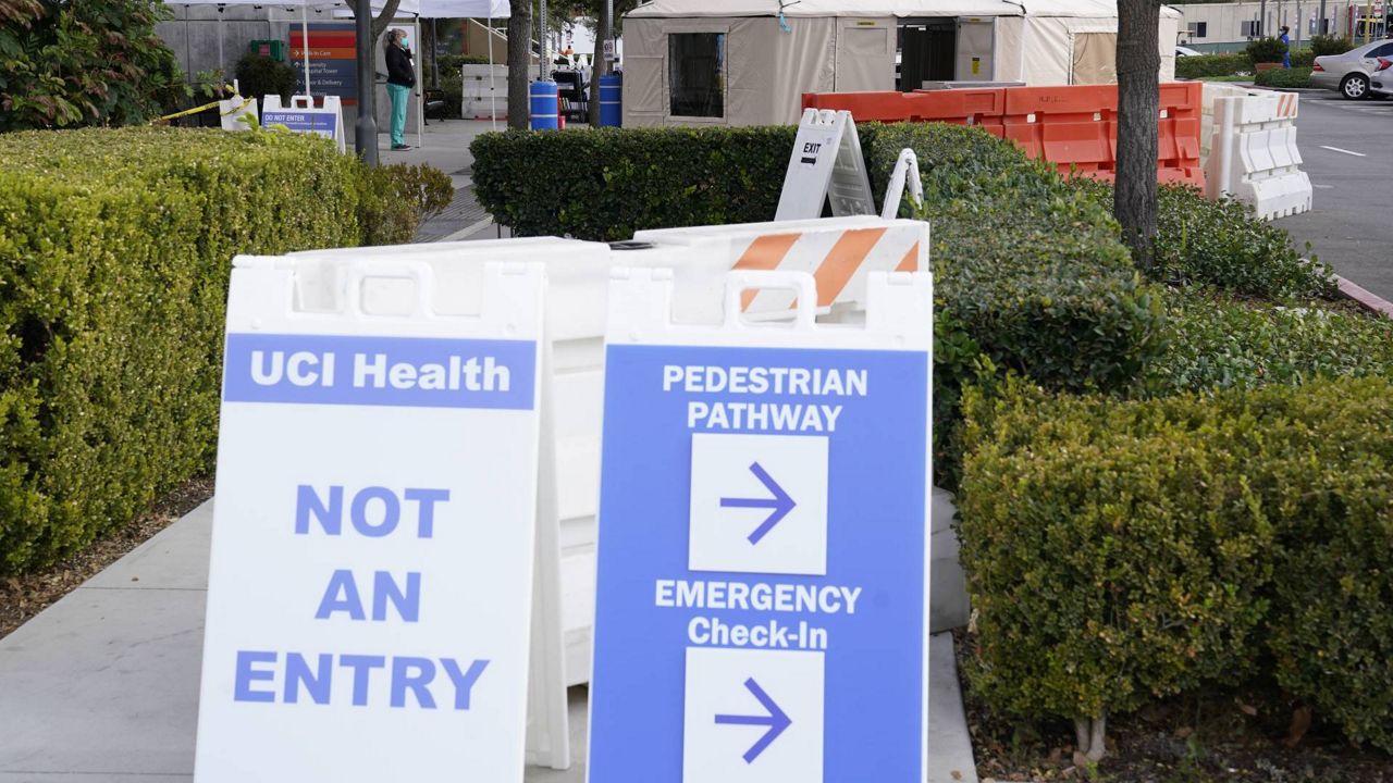 Medical tents are set up outside the emergency room at UCI Medical Center, Dec 17, 2020, in Irvine, Calif. (AP Photo/Ashley Landis)