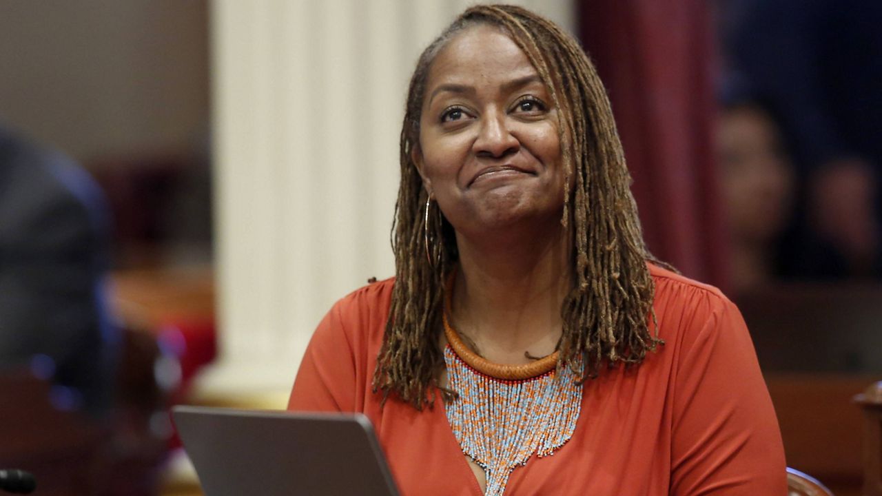 In this July 8, 2019 file photo, state Sen. Holly Mitchell, D-Los Angeles, reacts in the Senate chamber in Sacramento, Calif. (AP Photo/Rich Pedroncelli, File)