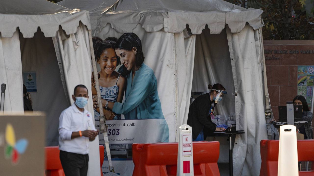 Medical tents for vaccinations are set outside the Children's Hospital Los Angeles Friday, Dec. 18, 2020. (AP/Damian Dovarganes)