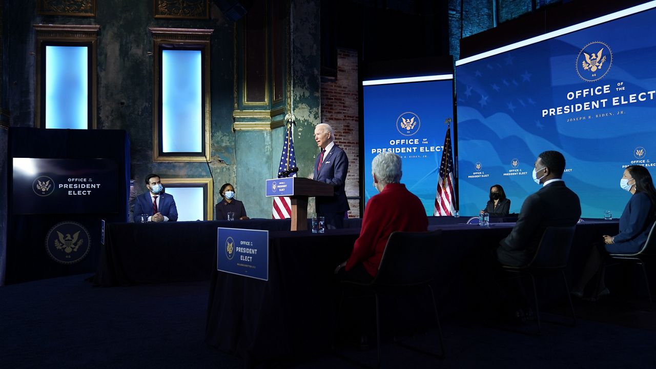 President-elect Joe Biden announces his climate and energy team nominees and appointees at The Queen Theater in Wilmington Del., Saturday, Dec. 19, 2020. (AP Photo/Carolyn Kaster)