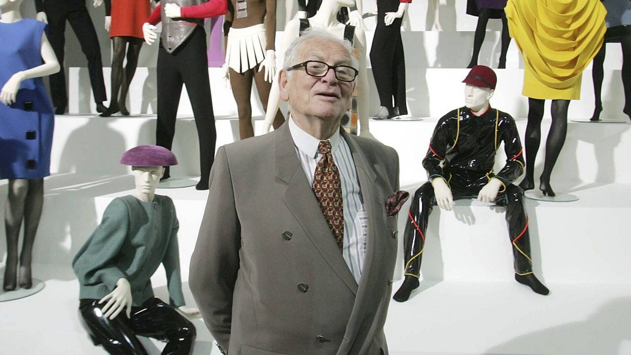 In this May 3, 2005 file photo, French fashion designer Pierre Cardin presents his exhibition "Design and Fashion 1950- 2005" at the academy for arts in Vienna, Austria. (AP Photo/Ronald Zak, File)