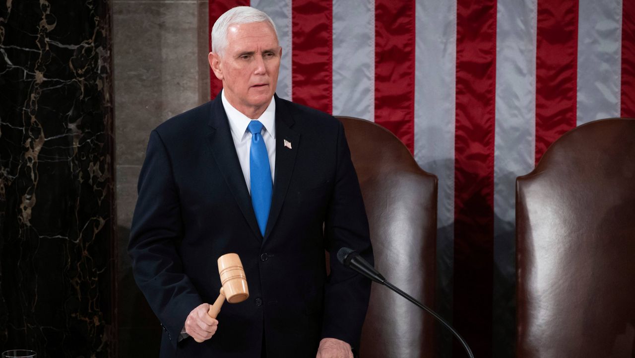 Vice President Mike Pence officiates as a joint session of Congress on Jan. 6 at the Capitol to confirm the Electoral College votes cast in the presidential election. (Saul Loeb/Pool via AP, File)