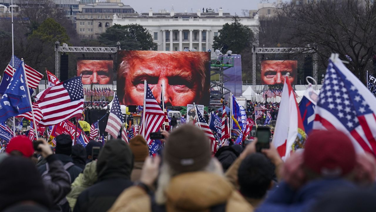 FILE - In this Jan. 6, 2021, file photo, Trump supporters participate in a rally in Washington. (AP Photo/John Minchillo, File)