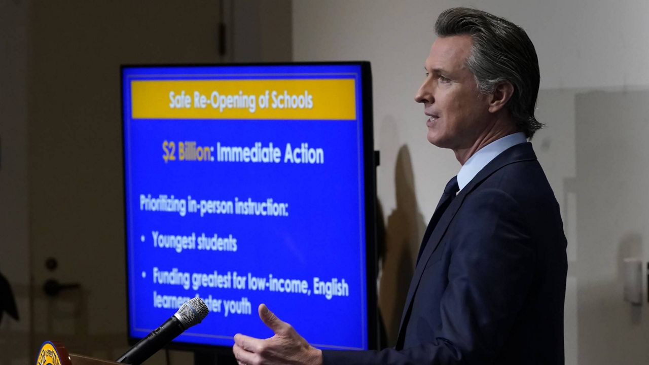 California Gov. Gavin Newsom outlines his 2021-2022 state budget proposal during a news conference in Sacramento, Calif., Friday, Jan. 8, 2021. (AP/Rich Pedroncelli, Pool)