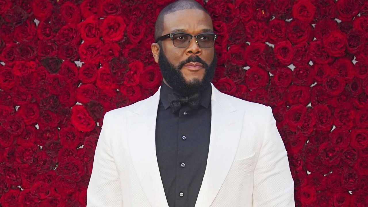 Tyler Perry poses at the grand opening of Tyler Perry Studios in Atlanta on Oct. 5, 2019. (Photo by Elijah Nouvelage/Invision/AP, File)