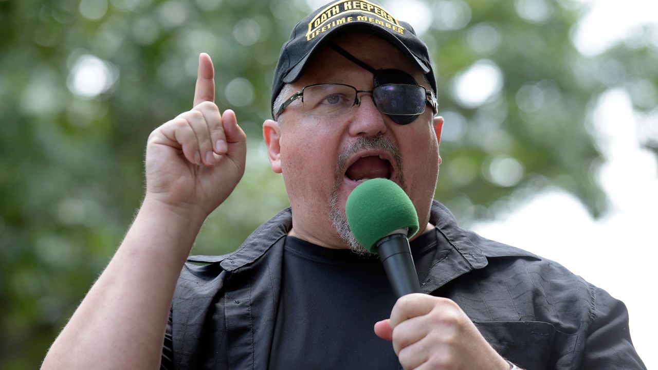 FILE - In this Sunday, June 25, 2017 file photo, Stewart Rhodes, founder of the citizen militia group known as the Oath Keepers speaks during a rally outside the White House in Washington. (AP Photo/Susan Walsh, File)