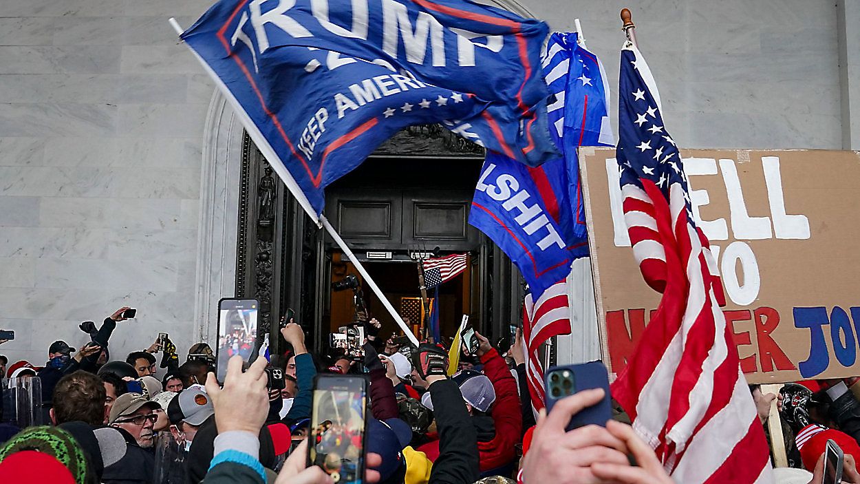 In this Jan. 6, 2021, file photo rioters break into the Capitol in Washington. (AP Photo/John Minchillo, File)