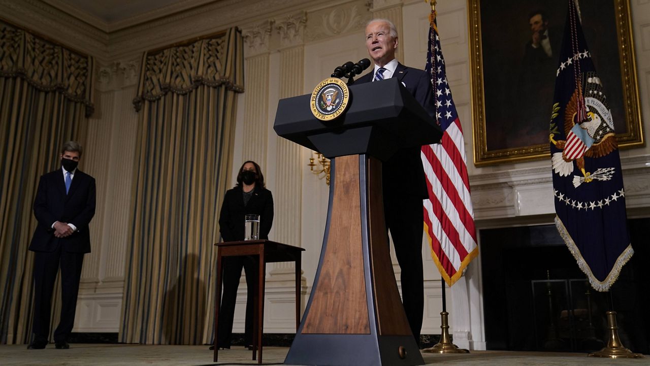 President Joe Biden delivers remarks on climate change and green jobs in the State Dining Room of the White House on Wednesday. (AP Photo/Evan Vucci)