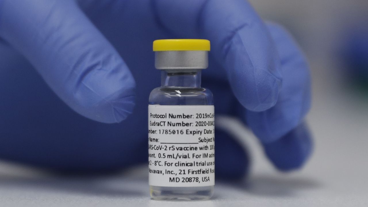 A vial of the Phase 3 Novavax coronavirus vaccine is seen ready for use in the trial at St. George's University hospital in London Wednesday, Oct. 7, 2020. (AP Photo/Alastair Grant)