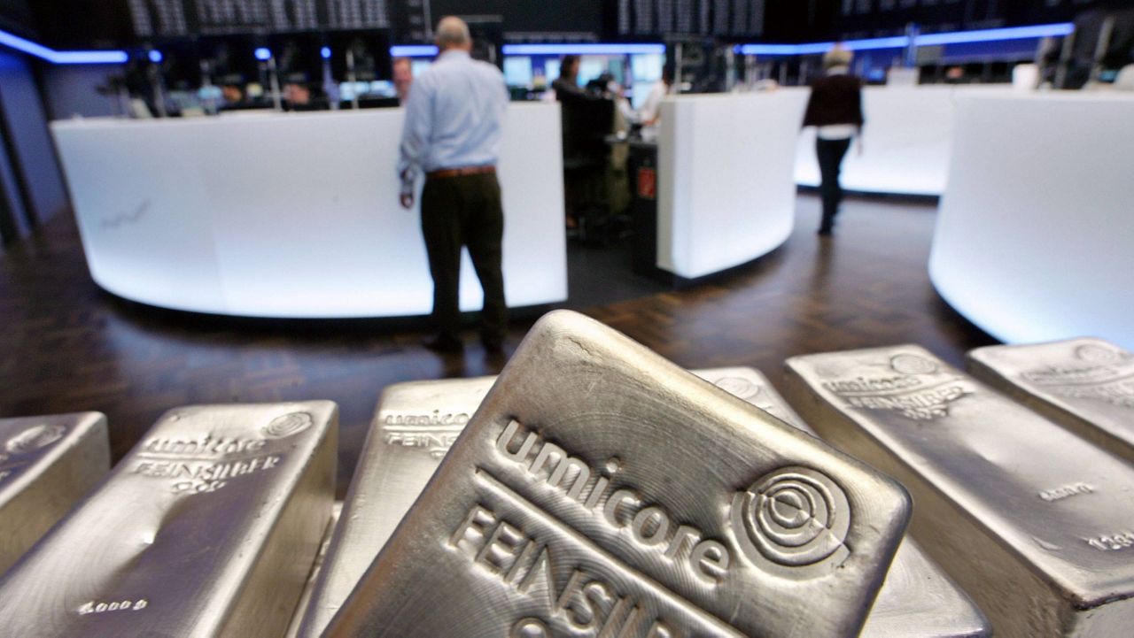 In this 2007 file photo, silver bullion bars are displayed in the trading room of the stock exchange in Frankfurt, Germany. (AP Photo/Michael Probst, FILE)