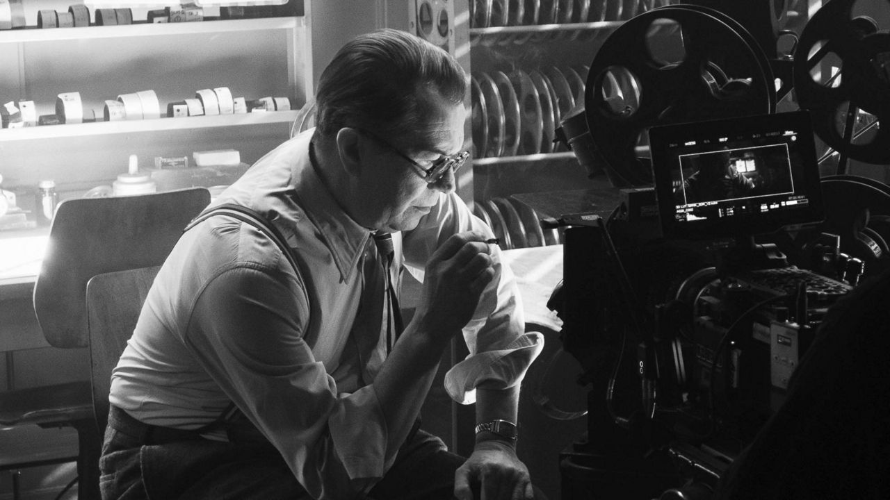In this image released by Netflix, Gary Oldman portrays Herman Mankiewicz in a scene from "Mank." (Nikolai Loveikis/Netflix via AP)