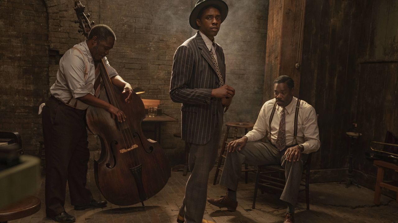 This image released by Netflix shows Michael Potts, from left, Chadwick Boseman and Colman Domingo in "Ma Rainey's Black Bottom." (David Lee/Netflix via AP)