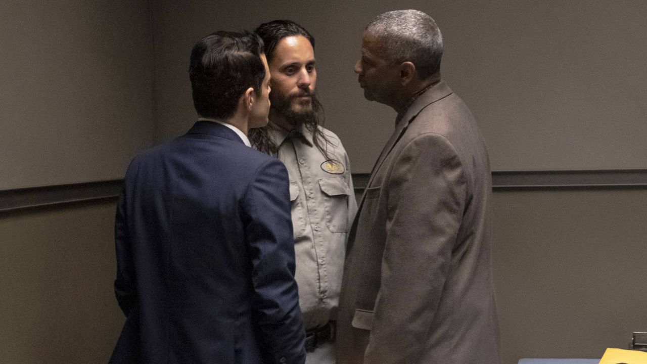 This image released by Warner Bros. Pictures shows Rami Malek, from left, Jared Leto and Denzel Washington in a scene from "The Little Things." (Nicola Goode/Warner Bros Pictures via AP)