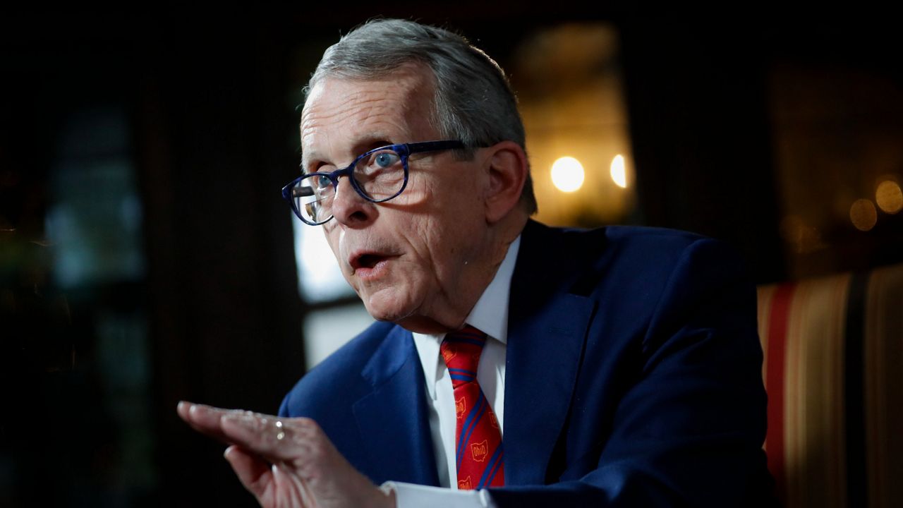 In this Dec. 13, 2019, file photo, Ohio Gov. Mike DeWine speaks during an interview at the Governor's Residence in Columbus, Ohio. (AP Photo/John Minchillo, File)