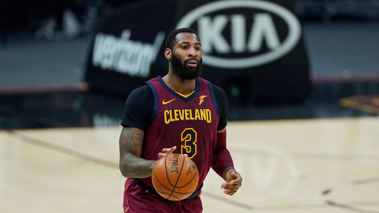 Cleveland Cavaliers' Andre Drummond drives in the second half of an NBA basketball game against the Milwaukee Bucks, Friday, Feb. 5, 2021, in Cleveland. (AP Photo/Tony Dejak)