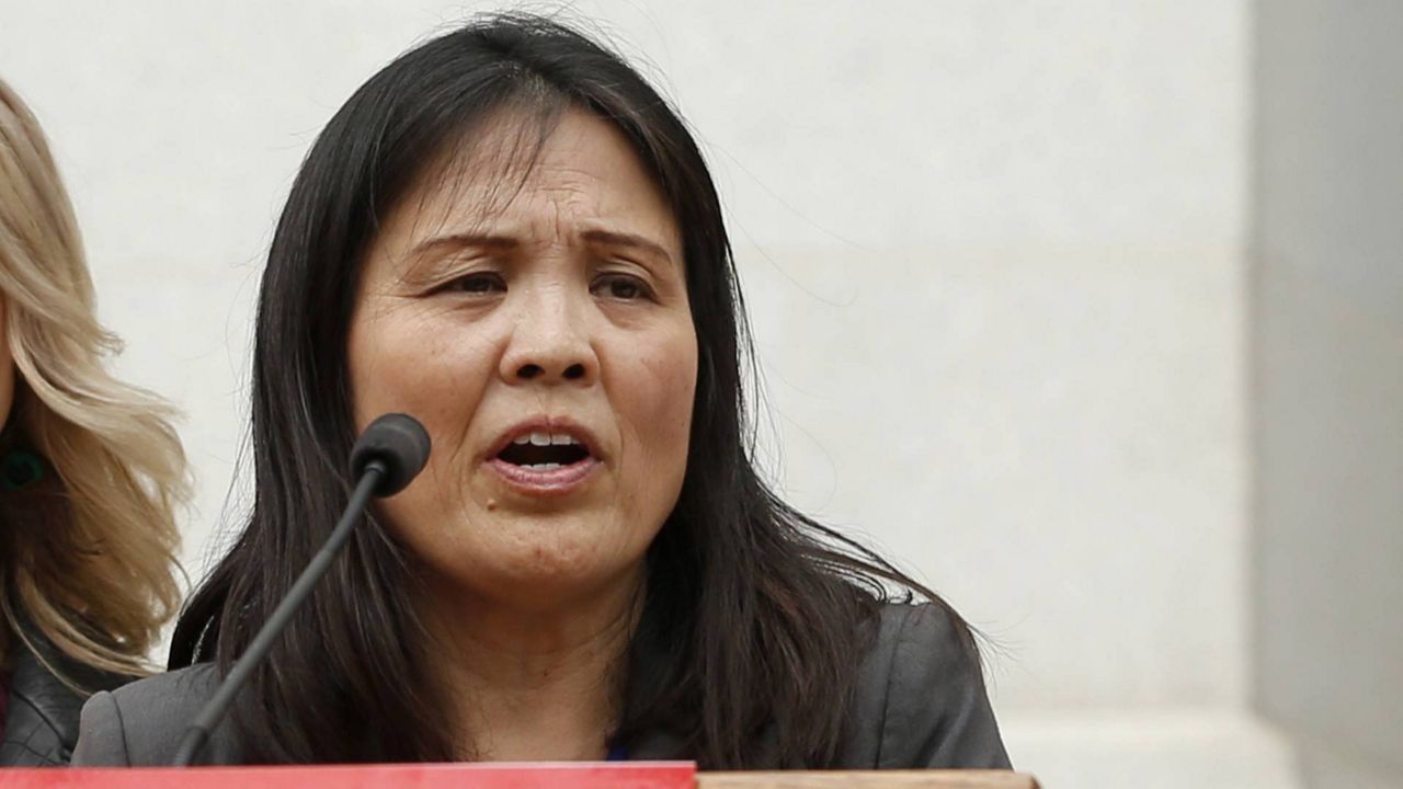 In this April 1, 2019 file photo, Julie Su, secretary of the California Labor and Workforce Development Agency speaks at an equal pay for women rally in Sacramento, Calif. (AP Photo/Rich Pedroncelli)