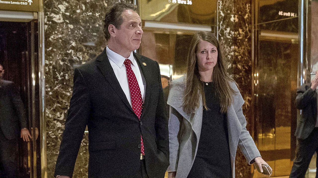 FILE — In this Jan. 18, 2017 file photo, New York Gov. Andrew Cuomo, accompanied by his chief of staff Melissa DeRosa, walks to talk with members of the media after meeting with President-elect Donald Trump at Trump Tower in New York. (AP Photo/Andrew Harnik, File)