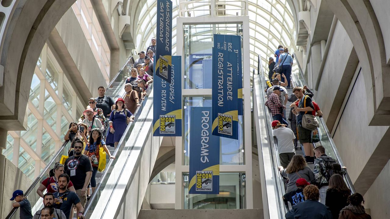 Attendees filter through the San Diego Convention Center on Day One at Comic-Con International on July 18, 2019, in San Diego, Calif. (Photo by Christy Radecic/Invision/AP, File)
