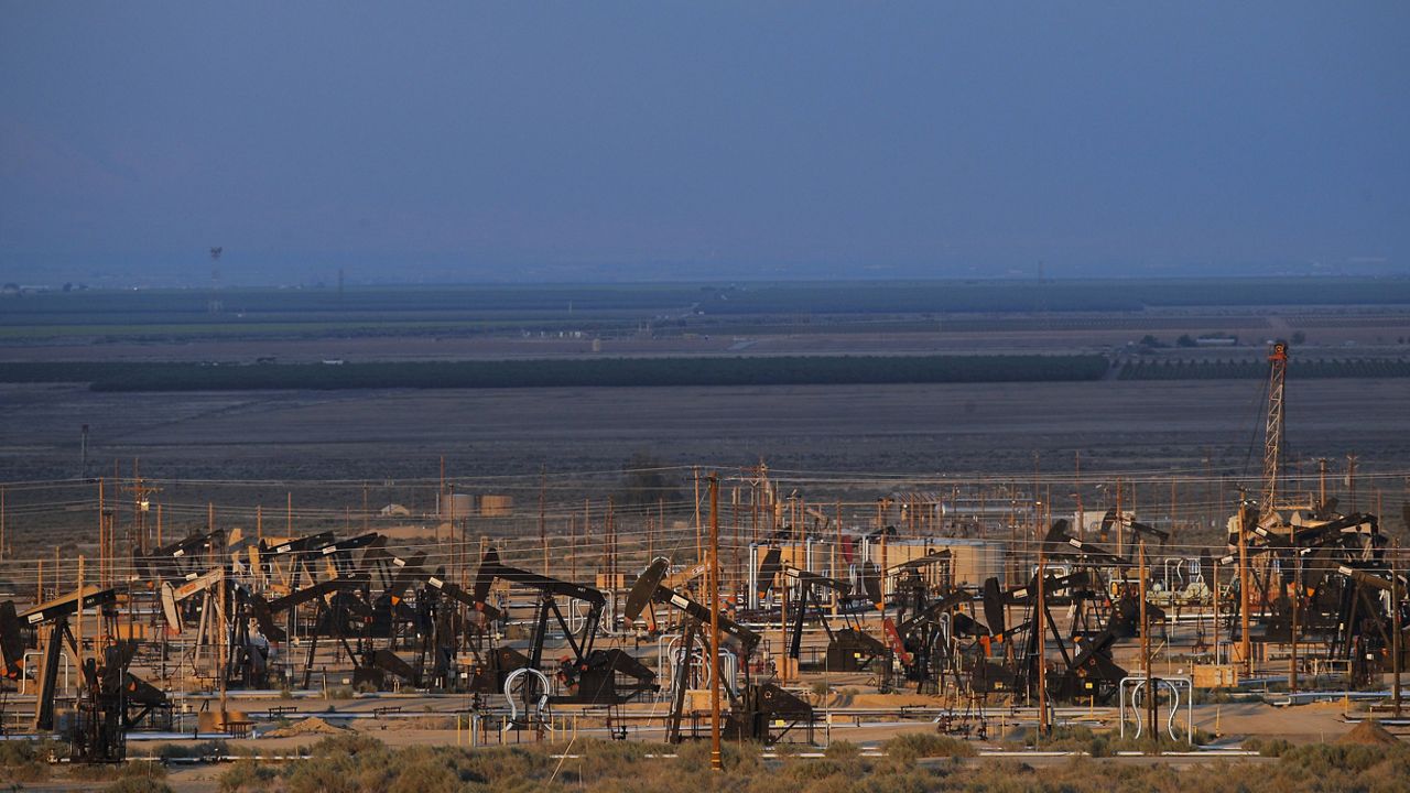 Oil pump jacks in an oil field near Taft, Calif. (AP Photo/Jae C. Hong)