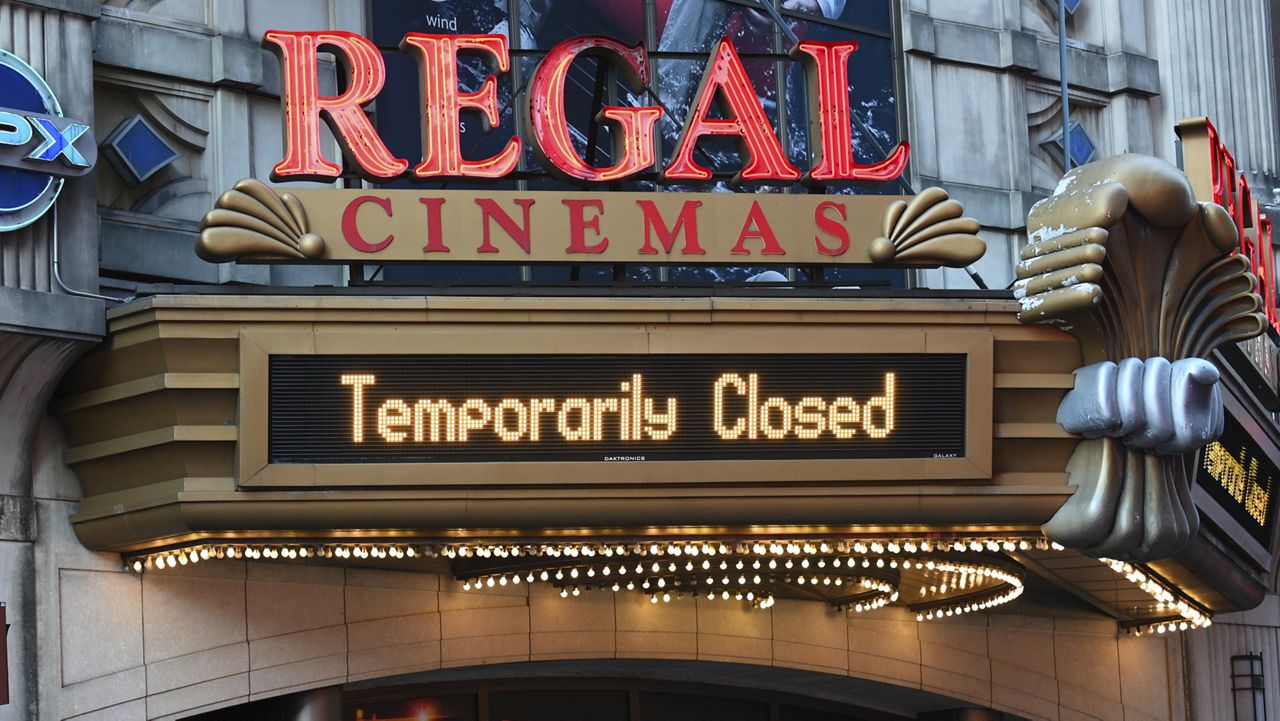 Regal Cinemas on 42nd Street remains closed on movie theater reopening day after COVID-19 closures, on March 5, 2021, in New York. (Photo by Evan Agostini/Invision/AP)