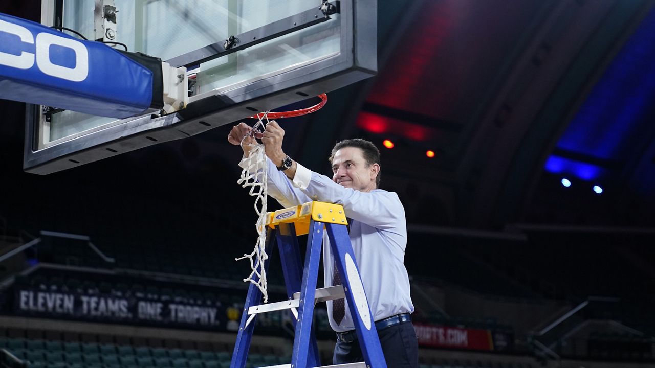 Iona coach Rick Pitino cuts the net after Iona's win in an NCAA college basketball game against Fairfield during the finals of the Metro Atlantic Athletic Conference tournament Saturday, March 13, 2021, in Atlantic City, N.J. (AP Photo/Matt Slocum)