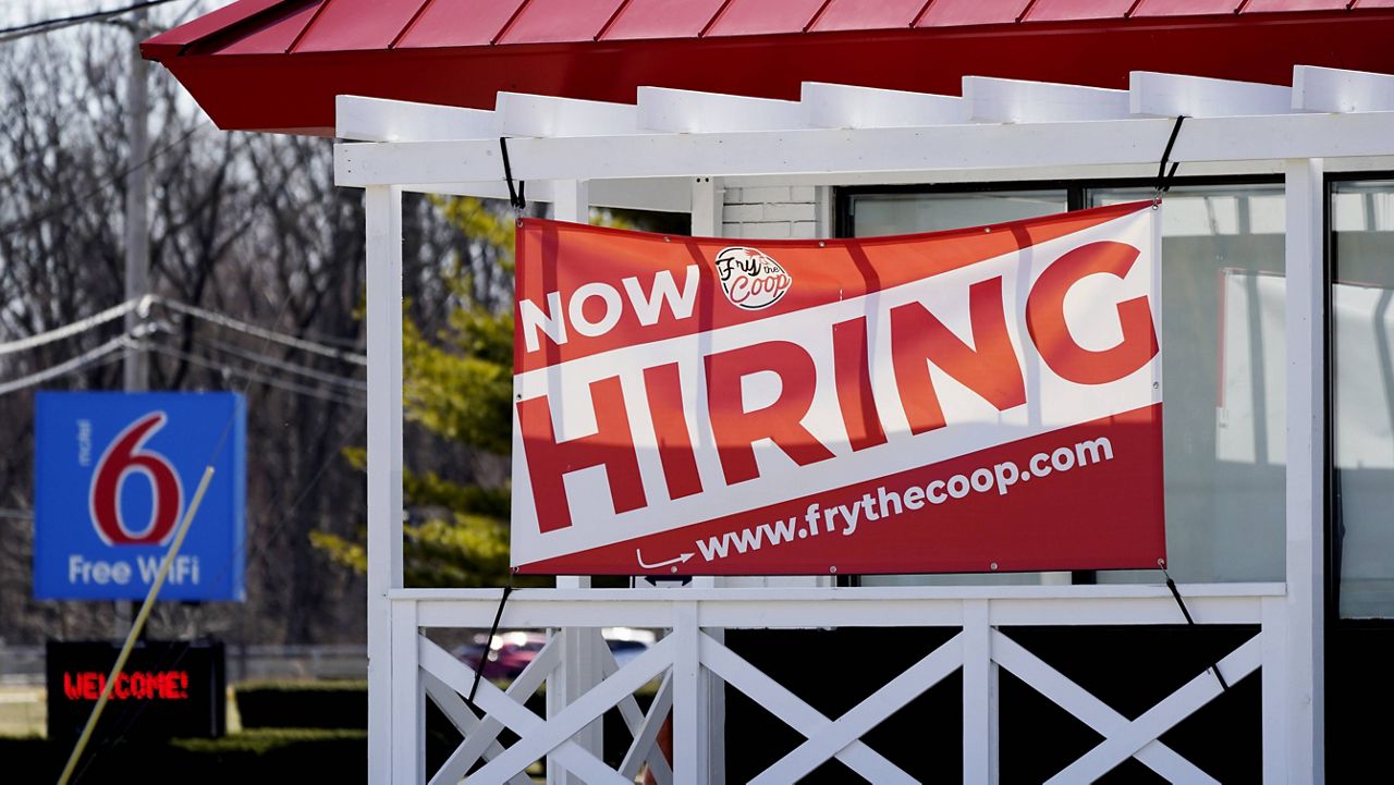 A hiring sign is seen outside a restaurant in Prospect Heights, Ill. (AP Photo/Nam Y. Huh, File)