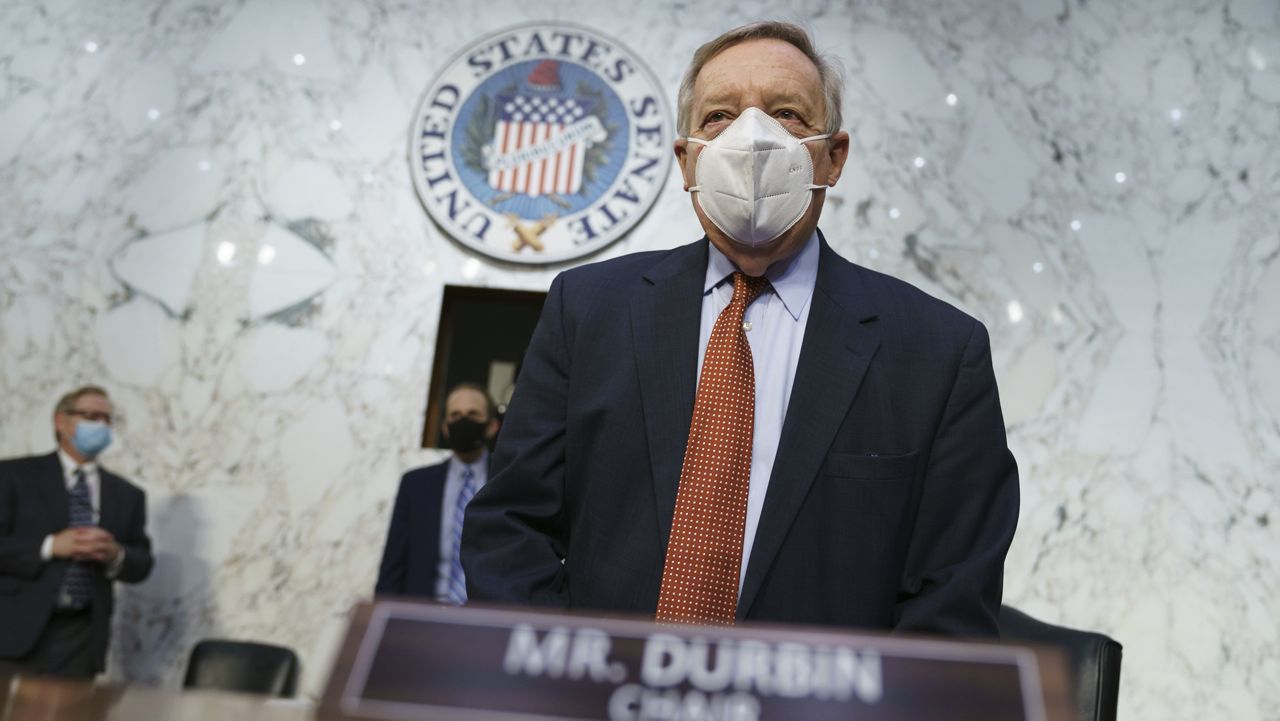 Sen. Dick Durbin, D-Ill., chairman of the Senate Judiciary Committee, arrives for a hearing to examine constitutional and common sense steps to reduce gun violence, at the Capitol in Washington, Tuesday, March 23, 2021. (AP Photo/J. Scott Applewhite)