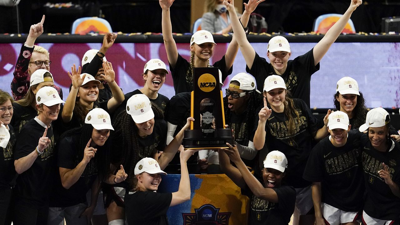 Gonzaga guard Jalen Suggs (1) celebrates making the game winning basket against UCLA during overtime in a men's Final Four NCAA college basketball tournament semifinal game, Saturday, April 3, 2021, at Lucas Oil Stadium in Indianapolis. Gonzaga won 93-90. (AP Photo/Michael Conroy)