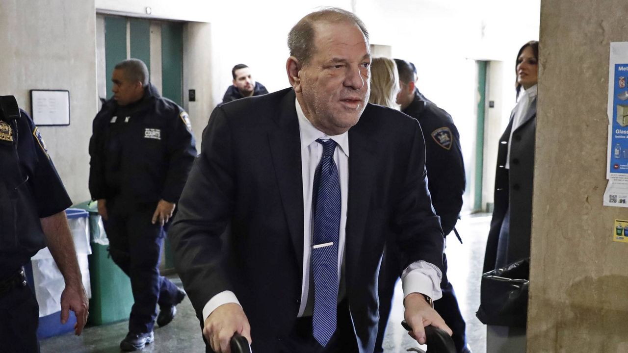 In this Feb. 21, 2020 file photo, Harvey Weinstein arrives at a Manhattan court as jury deliberations continue in his rape trial, in New York. (AP Photo/Richard Drew)
