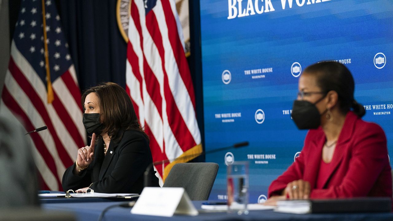 Vice President Kamala Harris, left, and White House Domestic Policy director Susan Rice, participate in a roundtable discussion highlighting the disparities that Black women face in maternal health at the Eisenhower Executive Office Building on the White House complex in Washington, Tuesday, April 13, 2021. (AP Photo/Manuel Balce Ceneta)