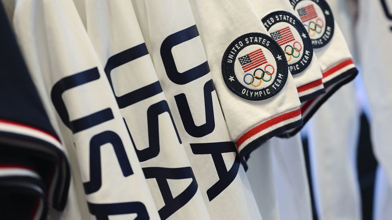 File: Team USA Tokyo Olympic closing ceremony uniforms are displayed during the unveiling at the Ralph Lauren SoHo Store on April 13, 2021, in New York. Ralph Lauren is an official outfitter of the 2021 U.S. Olympic Team. (Photo by Evan Agostini/Invision/AP)