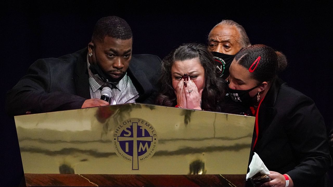 Katie and Aubrey Wright, parents of Daunte Wright, cry as the speak during his funeral services Thursday. (AP Photo/Julio Cortez, Pool)