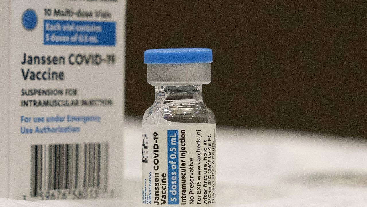In this March 3, 2021, file photo, a vial of the Johnson & Johnson COVID-19 vaccine is displayed at South Shore University Hospital in Bay Shore, N.Y. (AP Photo/Mark Lennihan, File)
