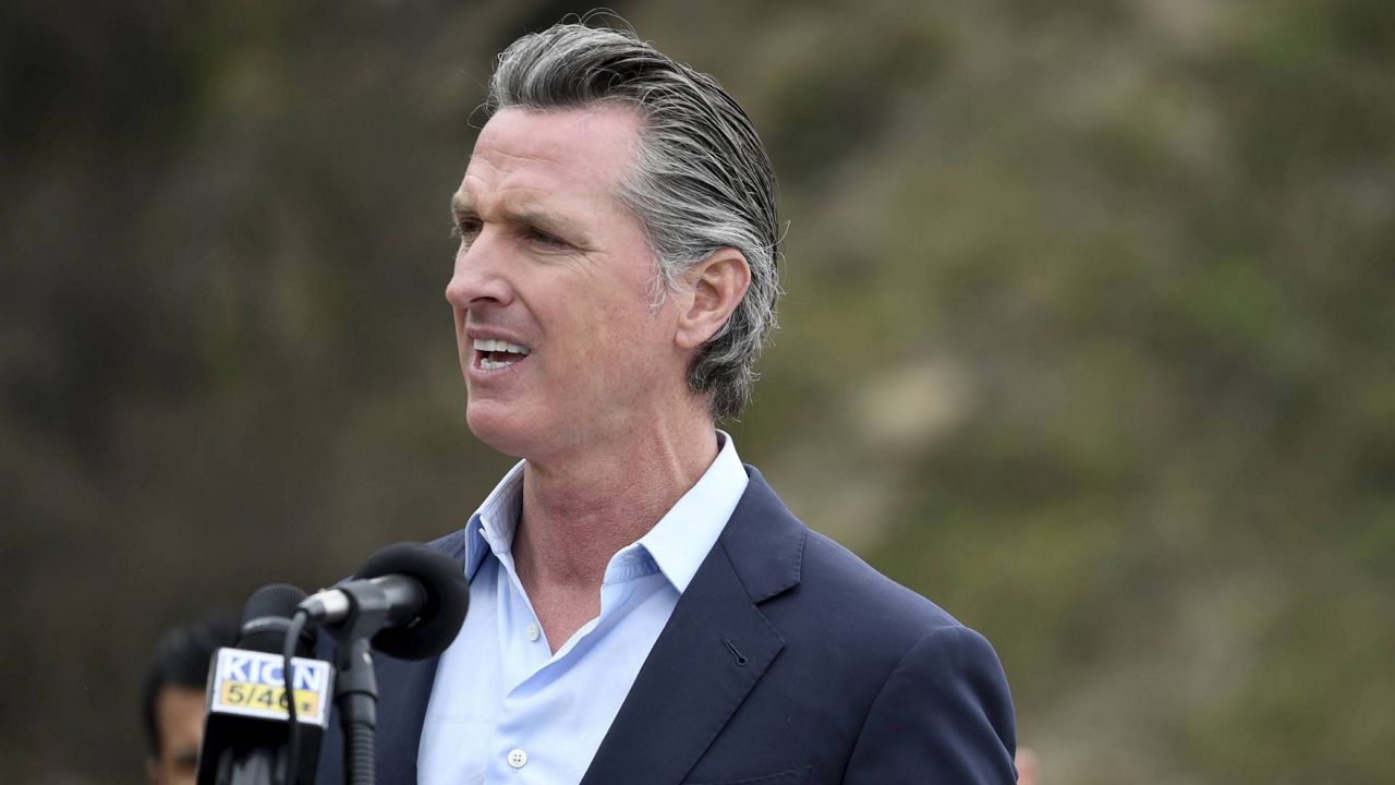 California Gov. Gavin Newsom speaks during a press conference about the newly reopened Highway 1 at Rat Creek near Big Sur, Calif., Friday, April 23, 2021. (AP Photo/Nic Coury)