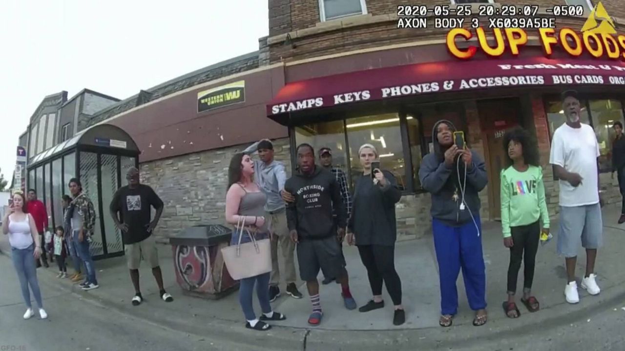 Darnella Frazier, third from right, records the deadly arrest of George Floyd on May 25, 2020, in Minneapolis. (Minneapolis Police Department via AP, File)