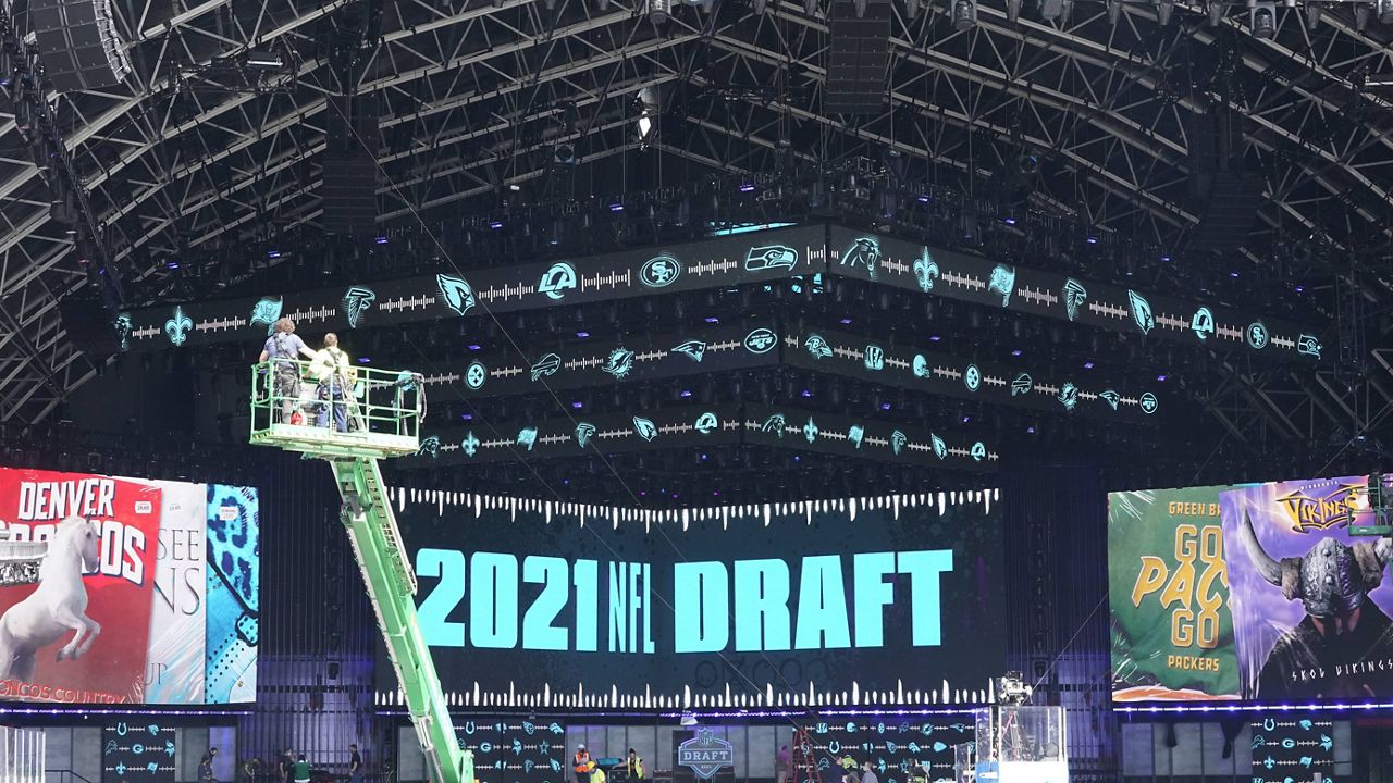 Workers prepare the NFL Draft Theatre on Tuesday in Cleveland. (AP Photo/Tony Dejak)