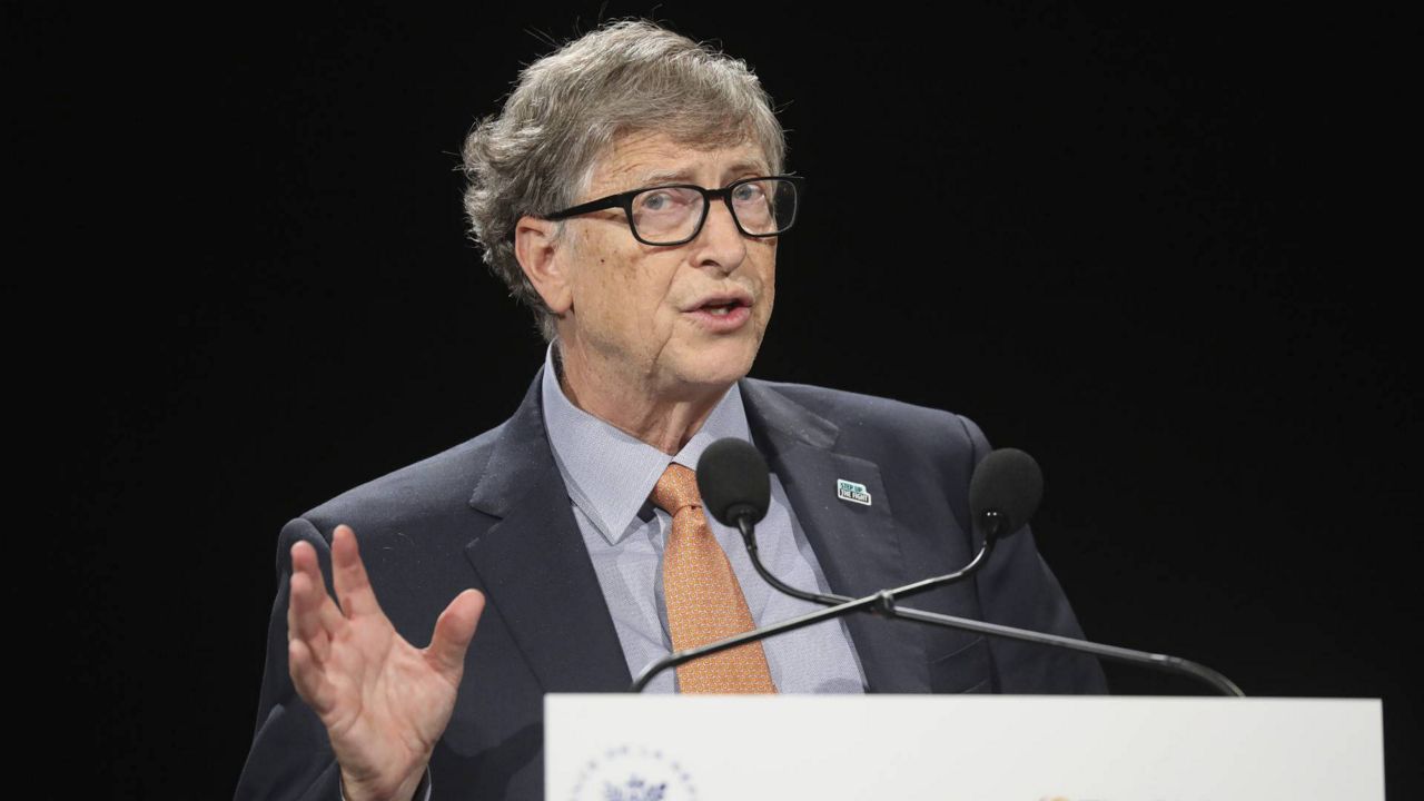 In this Oct. 10, 2019 file photo, Bill Gates gestures as he speaks to the audience during the Global Fund to Fight AIDS event at the Lyon's congress hall, central France. (Ludovic Marin/Pool Photo via AP)
