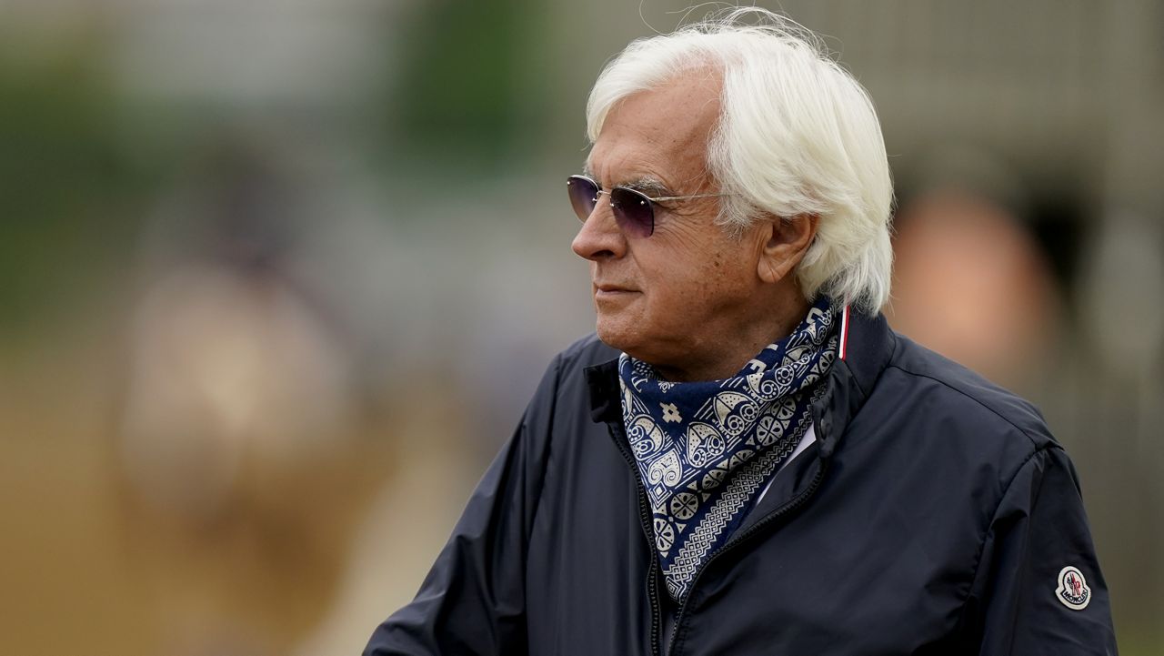 Trainer Bob Baffert watches workouts at Churchill Downs Wednesday, April 28, 2021, in Louisville, Ky. (AP Photo/Charlie Riedel)